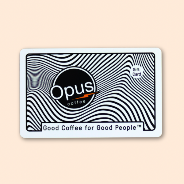 Black and white wavy Opus design Gift card. It says, "Good coffee for good people." on it and includes the Opus Coffee logo.