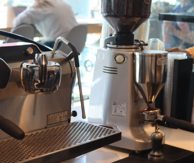 Grind (940 x 788 px) Opus Coffee grinder and espresso machine pictured.