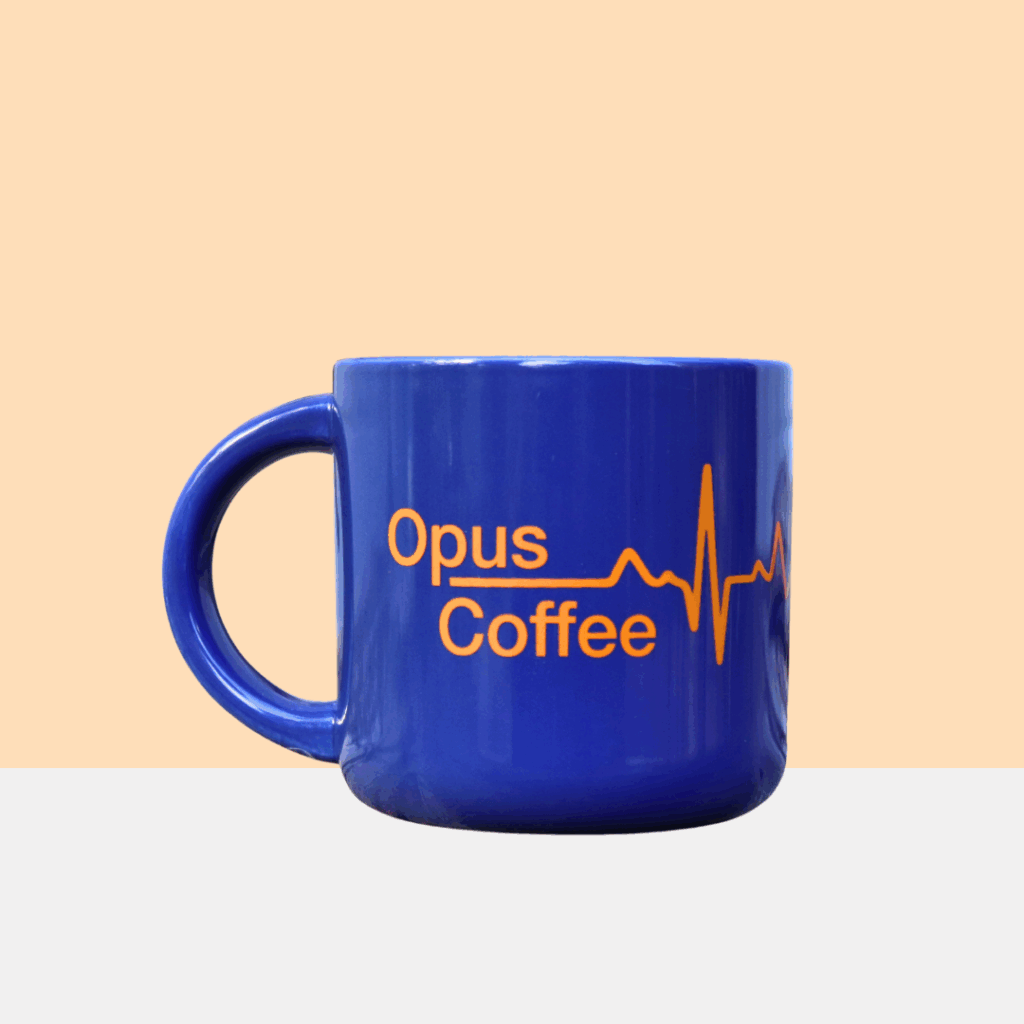 Royal Blue mug with Opus Coffee heartbeat logo in orange