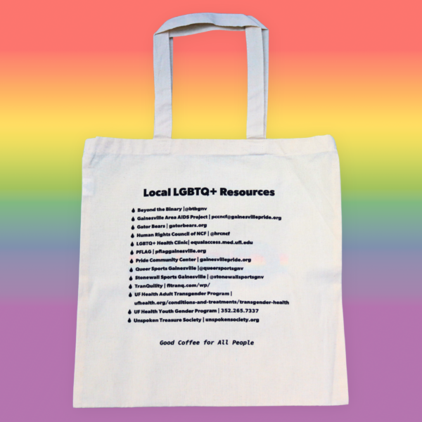 A list of Gainesville LGBTQ+ resources on a canvas tote.