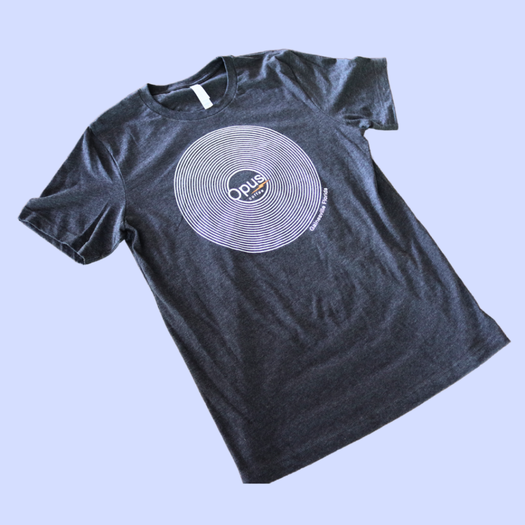 heather gray shirt with a vinyl record design with the opus coffee logo.