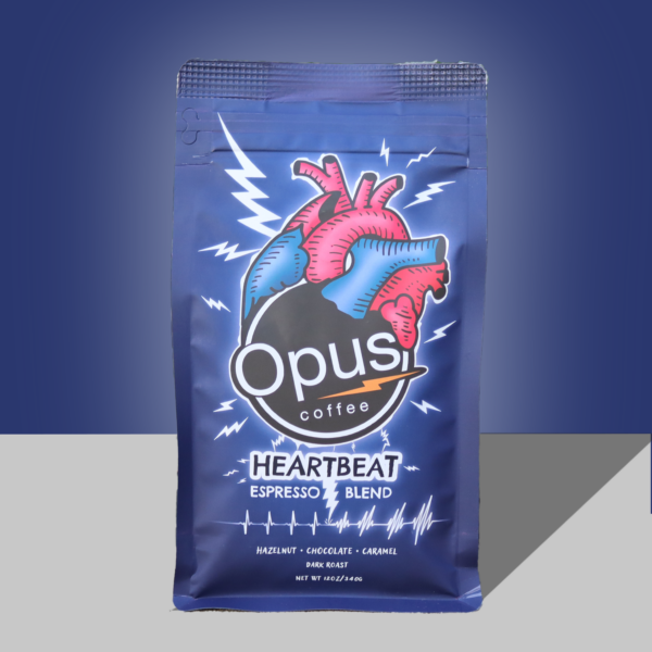 Opus heartbeat espresso blend pictured on blue background.