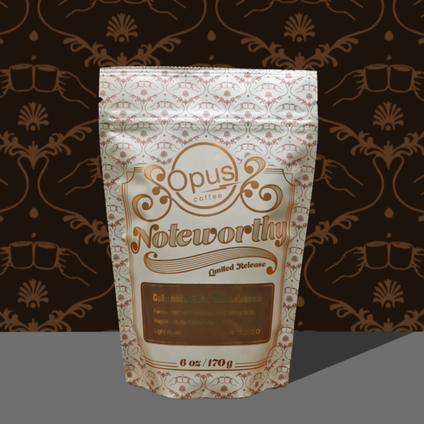 Bag of Opus Coffee Noteworthy Colombia Reserve coffee in front of a brown background.